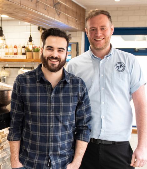 Nick Miller and Mark Coaker at Millers Fish and Chips, inside the restaurant